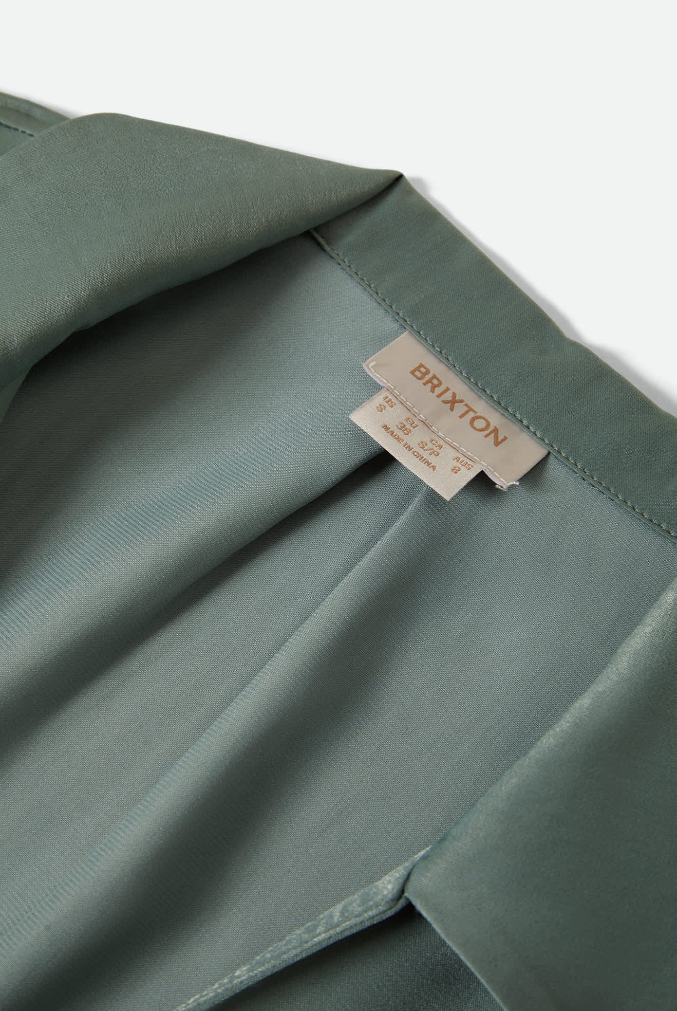 Women's Soho Silky Top in the color Blue Green Shine - Additional Laydown image