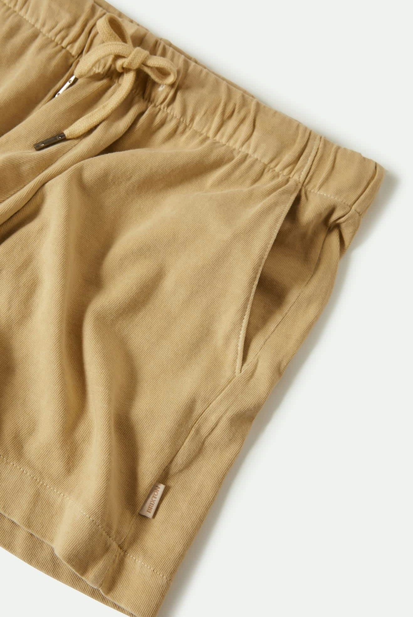 Women's Carefree Organic Garment Dyed Lounge Short in the color Pale Khaki - Additional Laydown image