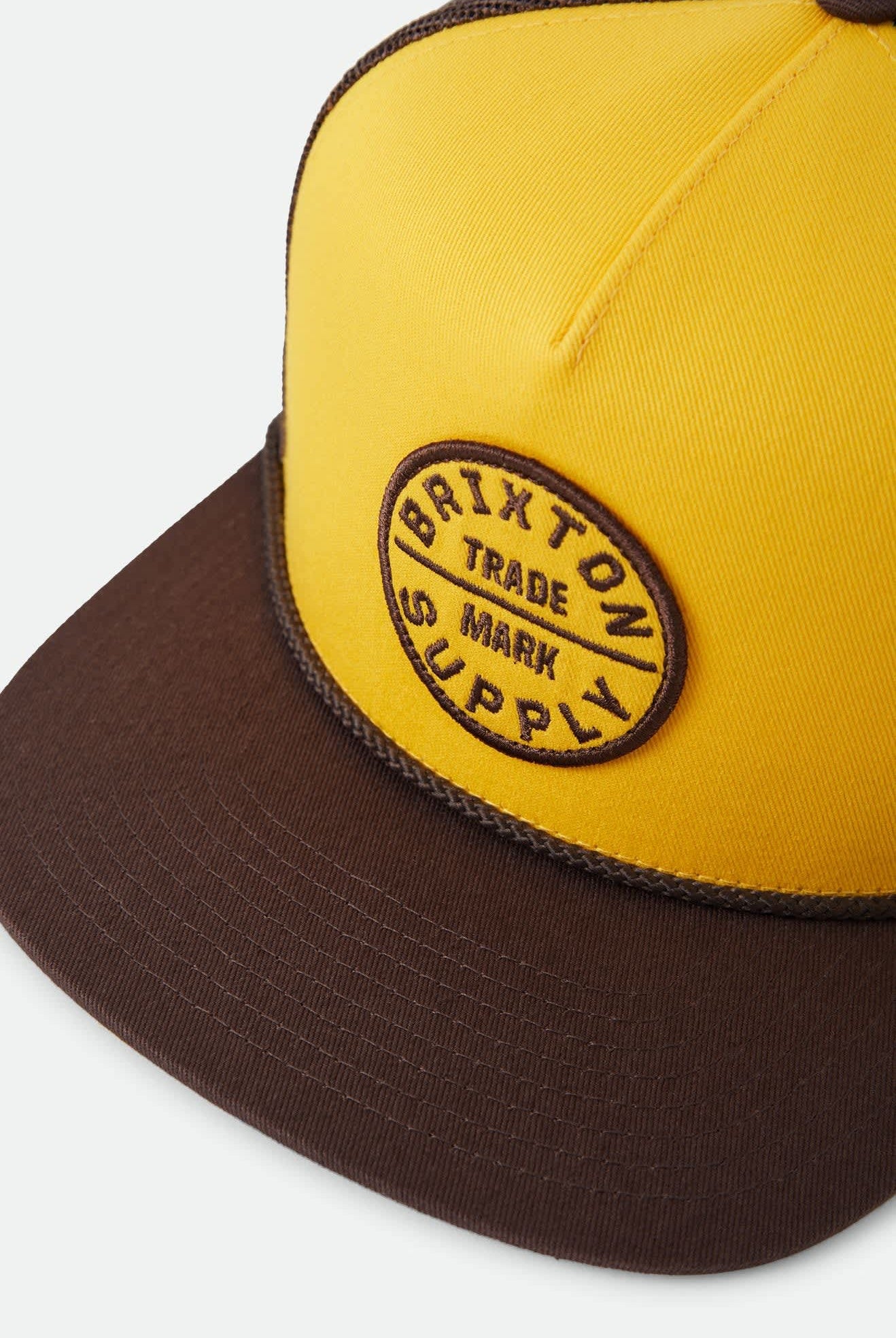 Unisex Oath Trucker Hat in the color Golden Hour/Coco - Additional Laydown image