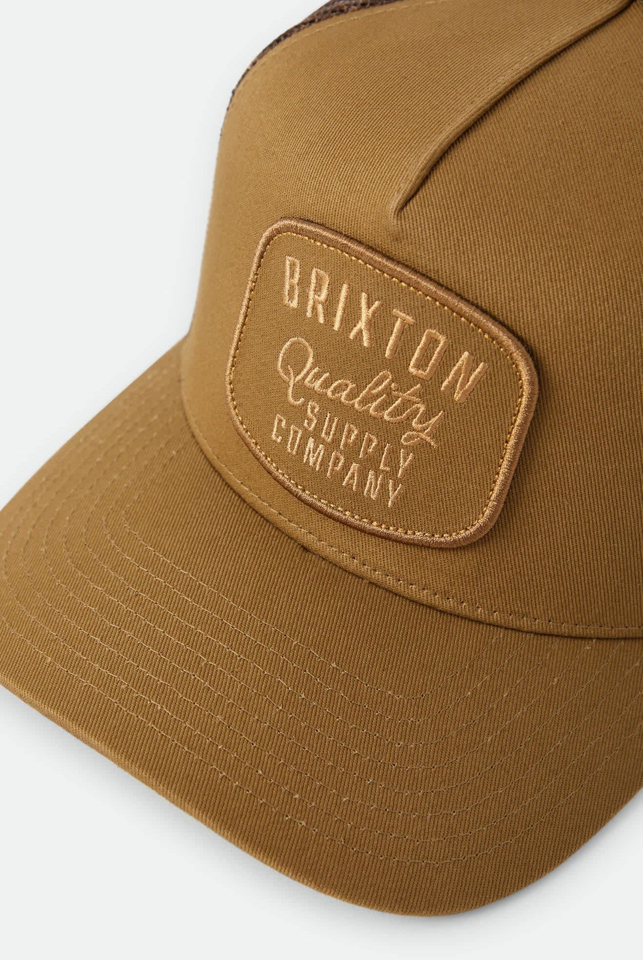 Unisex Hubal Trucker Hat in the color Dusted Ochre - Additional Laydown image