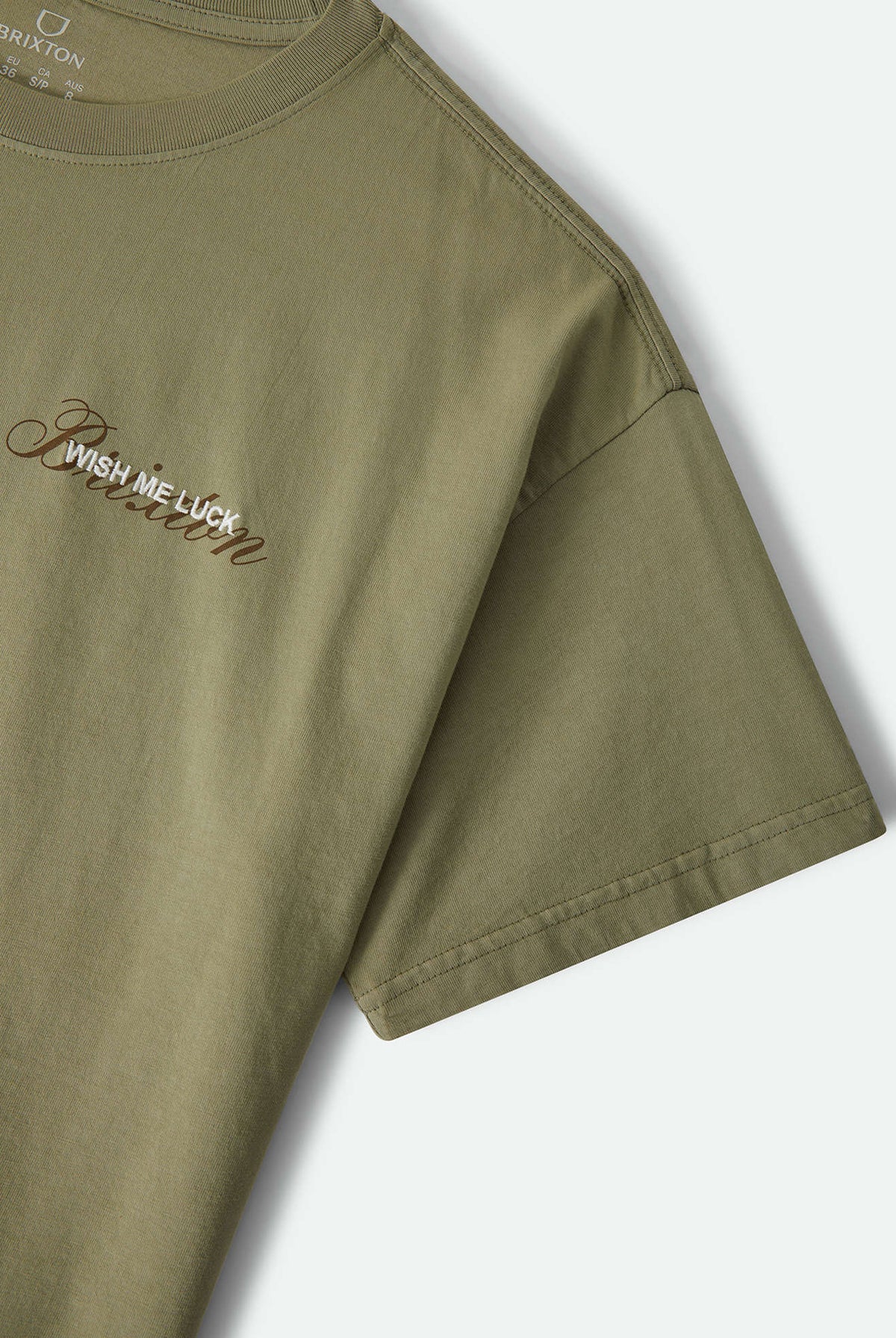 Women's Wish Me Luck Boxy Crop T-Shirt in the color Olive Surplus - Additional Laydown image