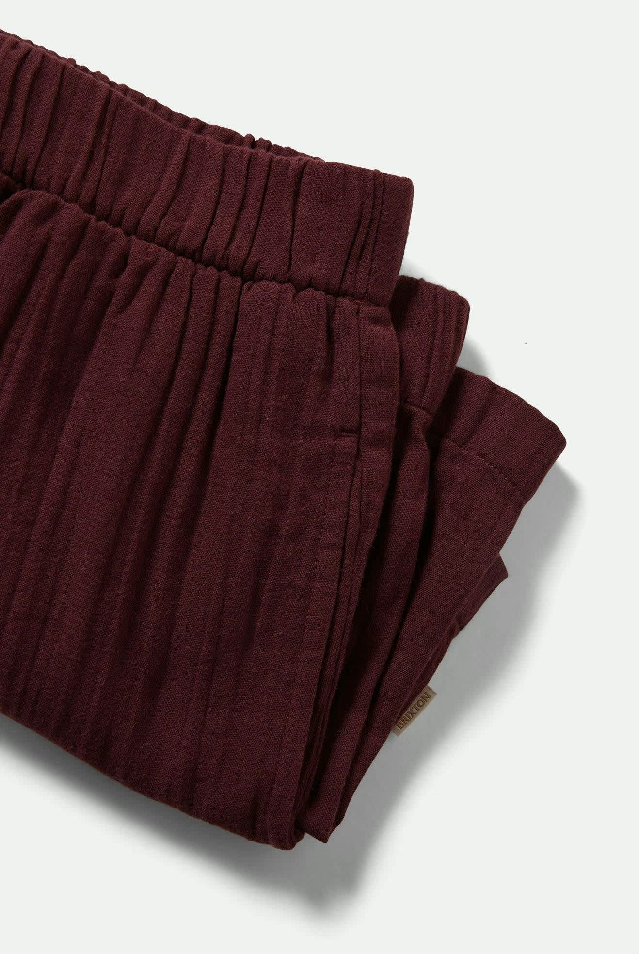 Women's Wandering Short in the color Port - Additional Laydown image