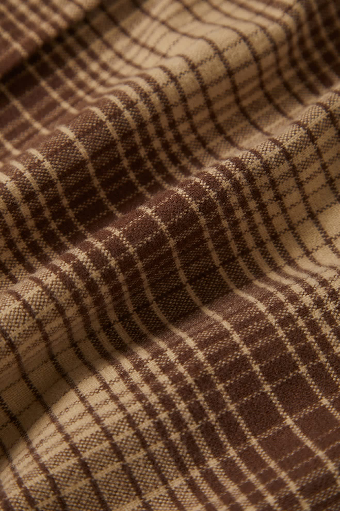 Men's Builders Bowery Stretch Water Resistant L/S Flannel in the color Pine Needle/Sunbaked - Additional Laydown image