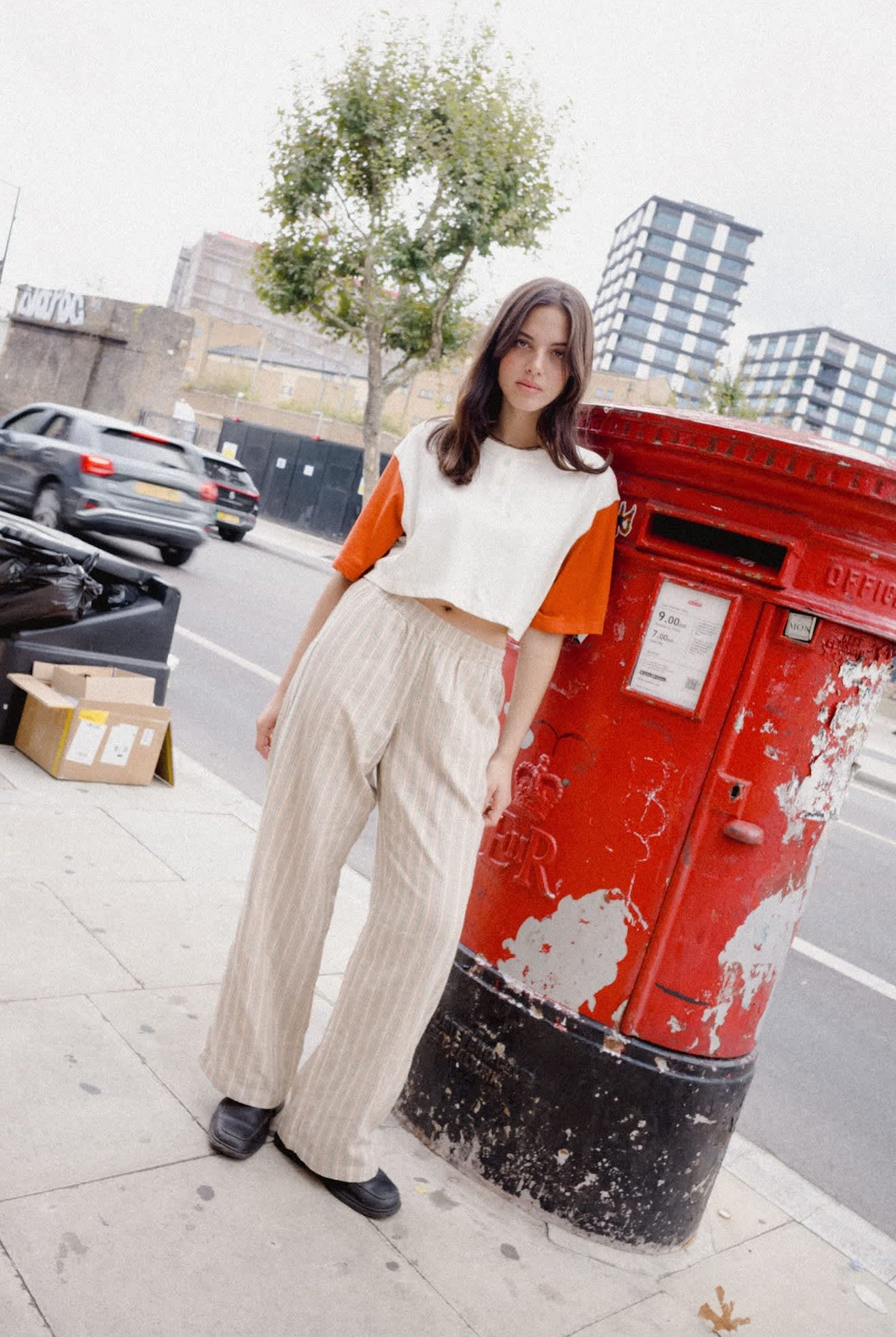 Women's Carefree Organic Garment Dye Cropped Henley in the color Off White/Rust - Women's Lifestyle image