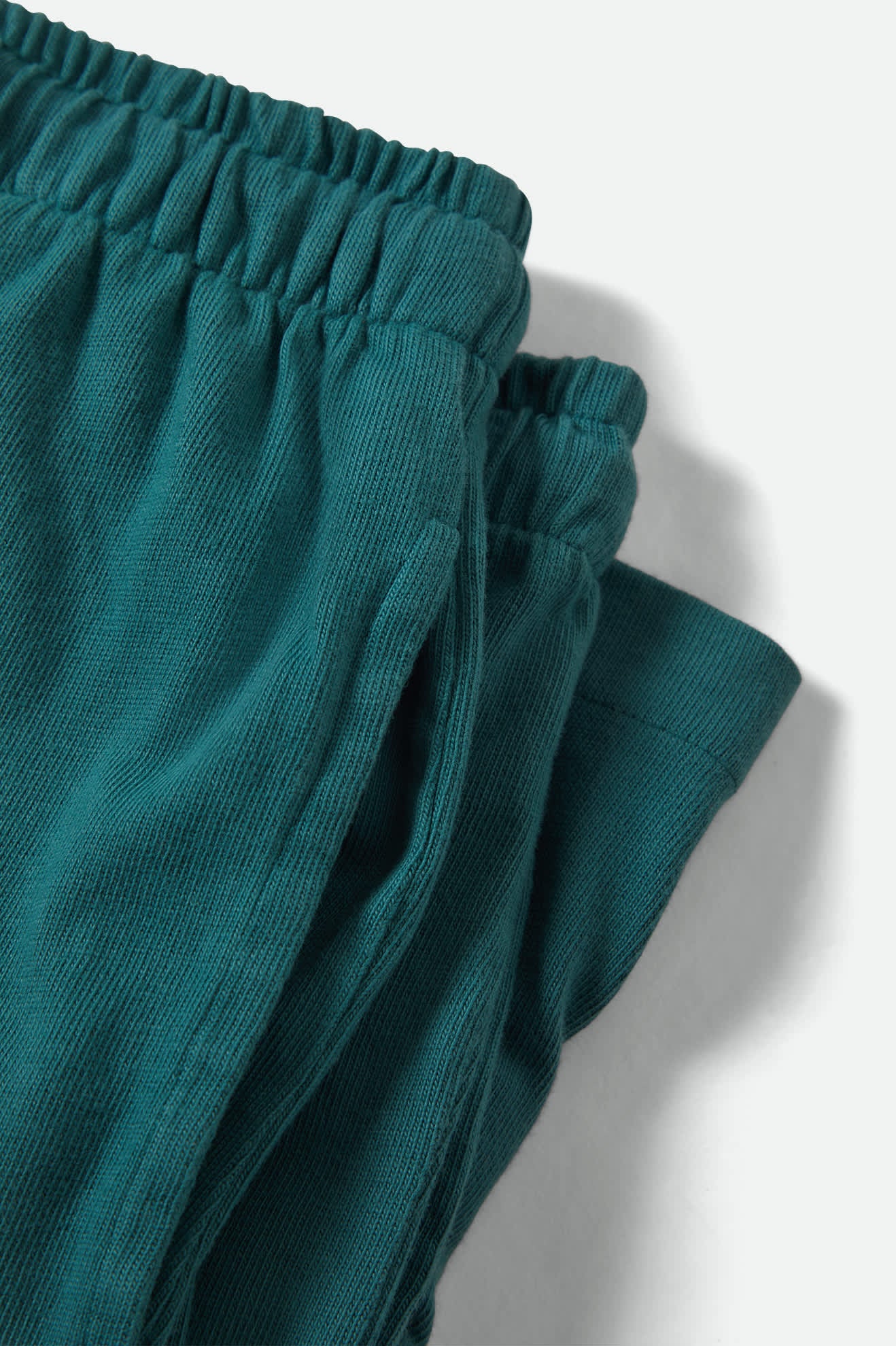 Women's Carefree Organic Garment Dye Lounge Short in the color Washed Mediterranean Teal - Additional Laydown image