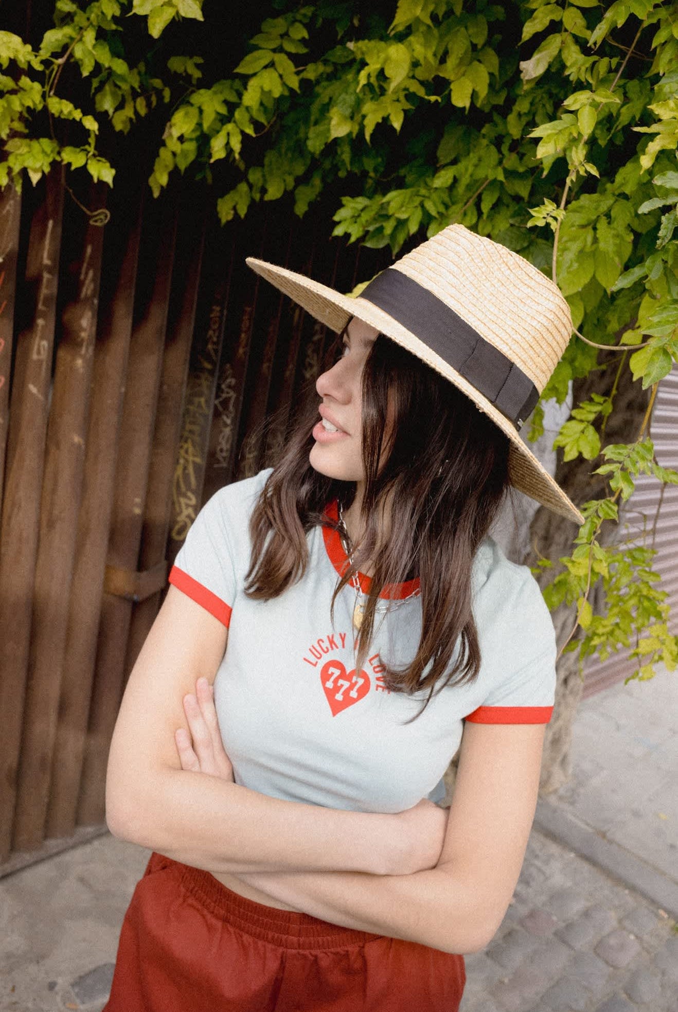 Women's Lucky In Love Baby T-Shirt in the color Sea Grass/Adrenaline Red - Women's Lifestyle image