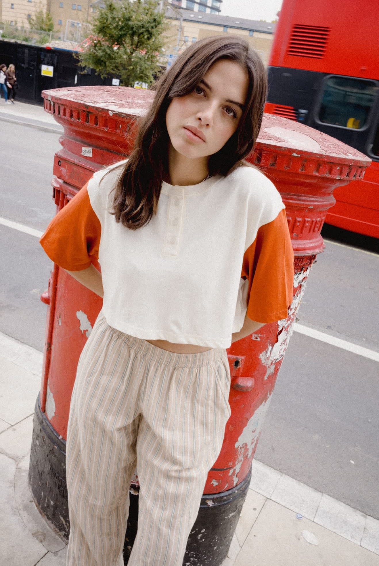 Women's Carefree Organic Garment Dye Cropped Henley in the color Off White/Rust - Women's Lifestyle image