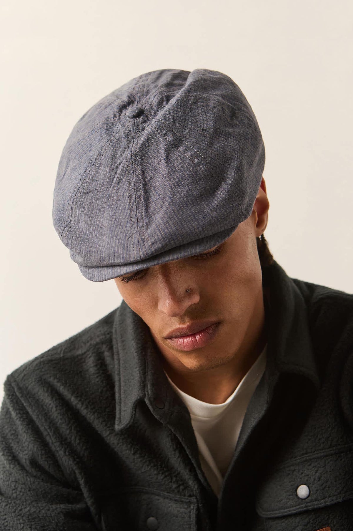 Unisex Brood Newsboy Cap in the color Indigo/Dark Sand - Additional Fit image