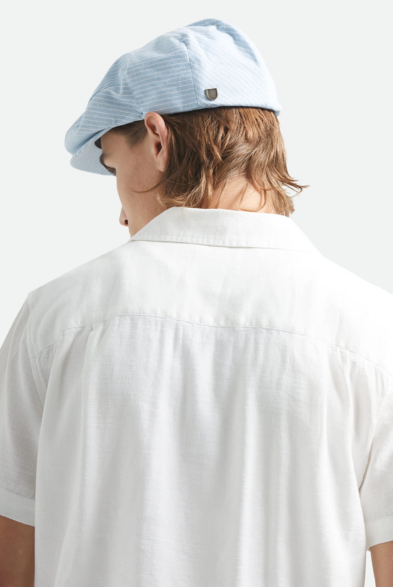 Unisex Hooligan Flat Cap in the color Light Blue/White - Men's Back View