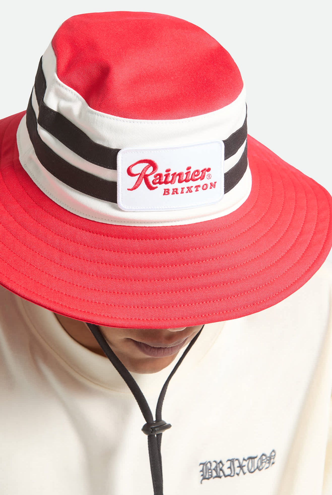 Unisex Rainier X Brixton Boonie in the color Natural/Red - Additional Fit image
