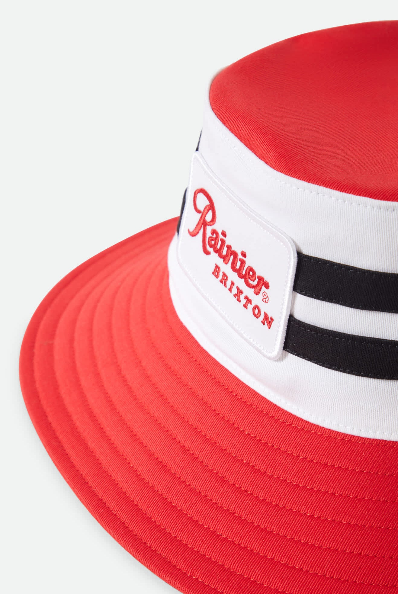 Unisex Rainier X Brixton Boonie in the color Natural/Red - Additional Laydown image