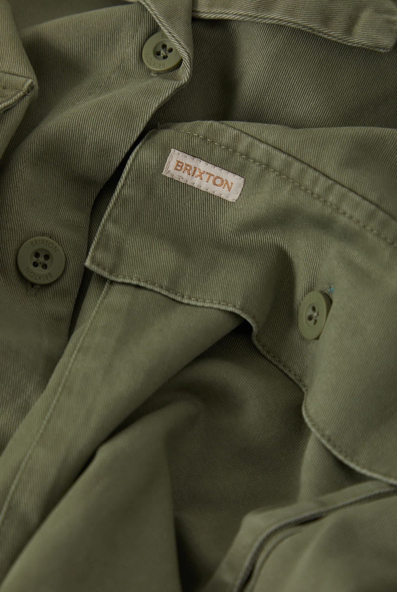 Women's Utopia Overshirt in the color Washed Olive Surplus - Additional Laydown image