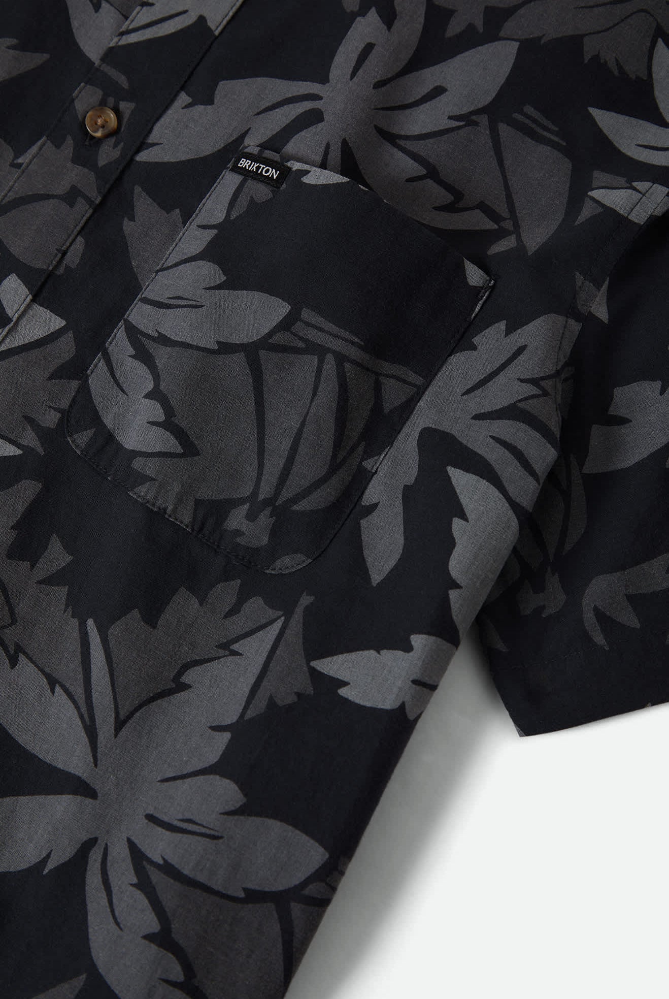 Men's Charter Print Short Sleeve Shirt in the color Black/Trooper/Future Grey Palm Floral - Additional Laydown image