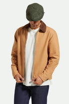 Unisex Brood Newsboy Cap in the color Moss/Orange - Men's Side View