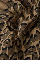 Women's Magnolia Tie Top in the color Brown Cheetah - Additional Laydown image