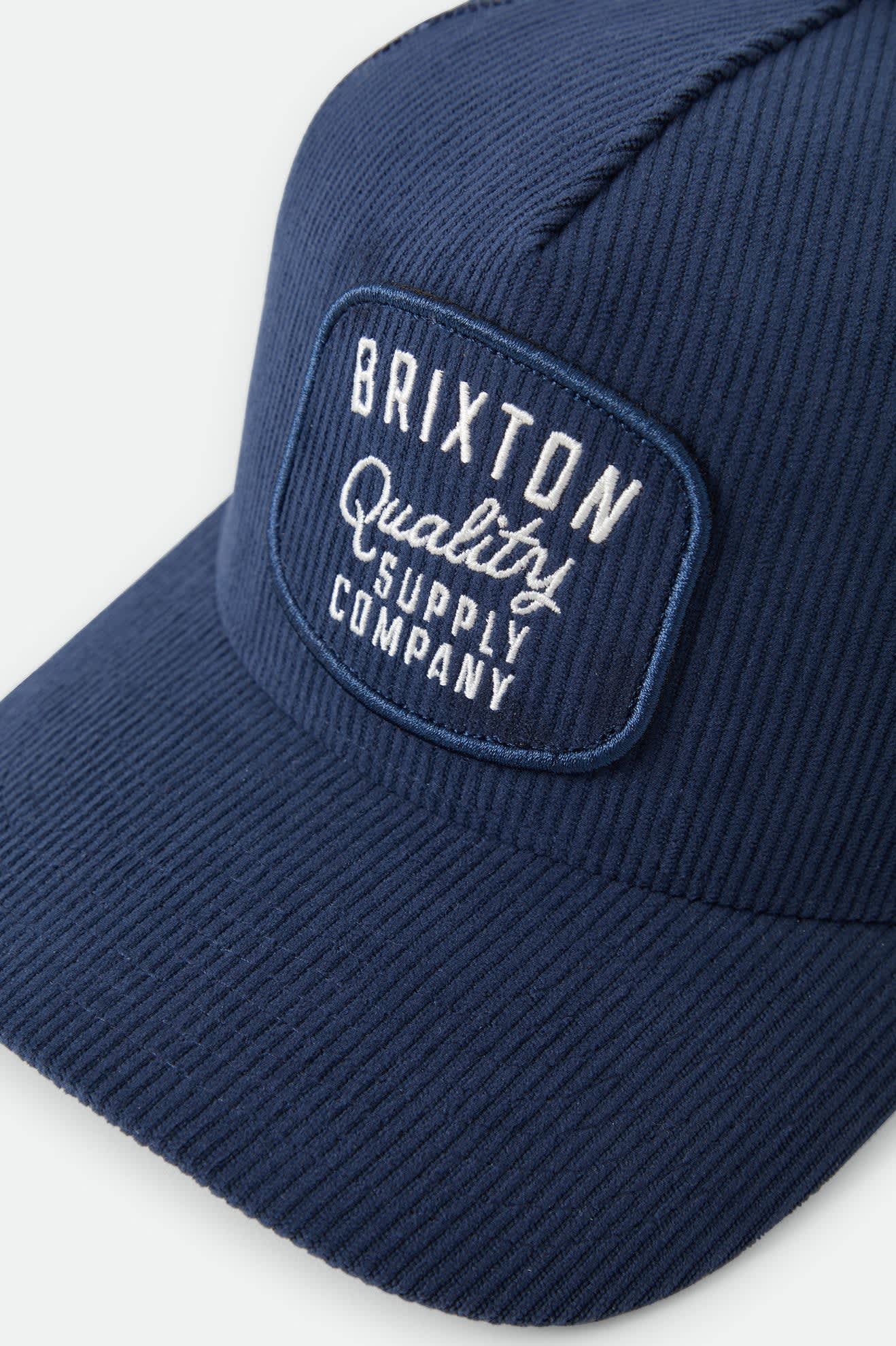 Unisex Hubal Trucker Hat in the color Dark Navy Corduroy - Additional Laydown image