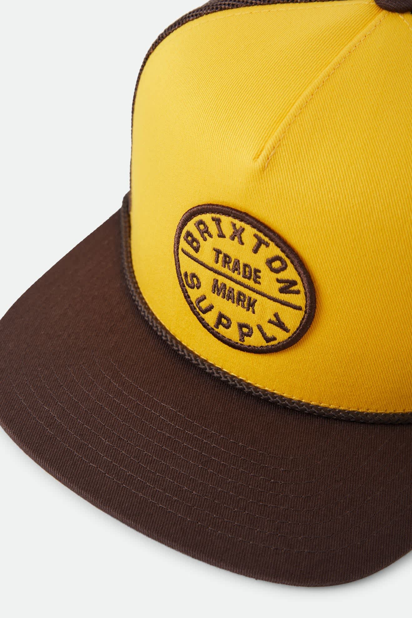 Unisex Oath Trucker Hat in the color Golden Hour/Coco - Additional Laydown image