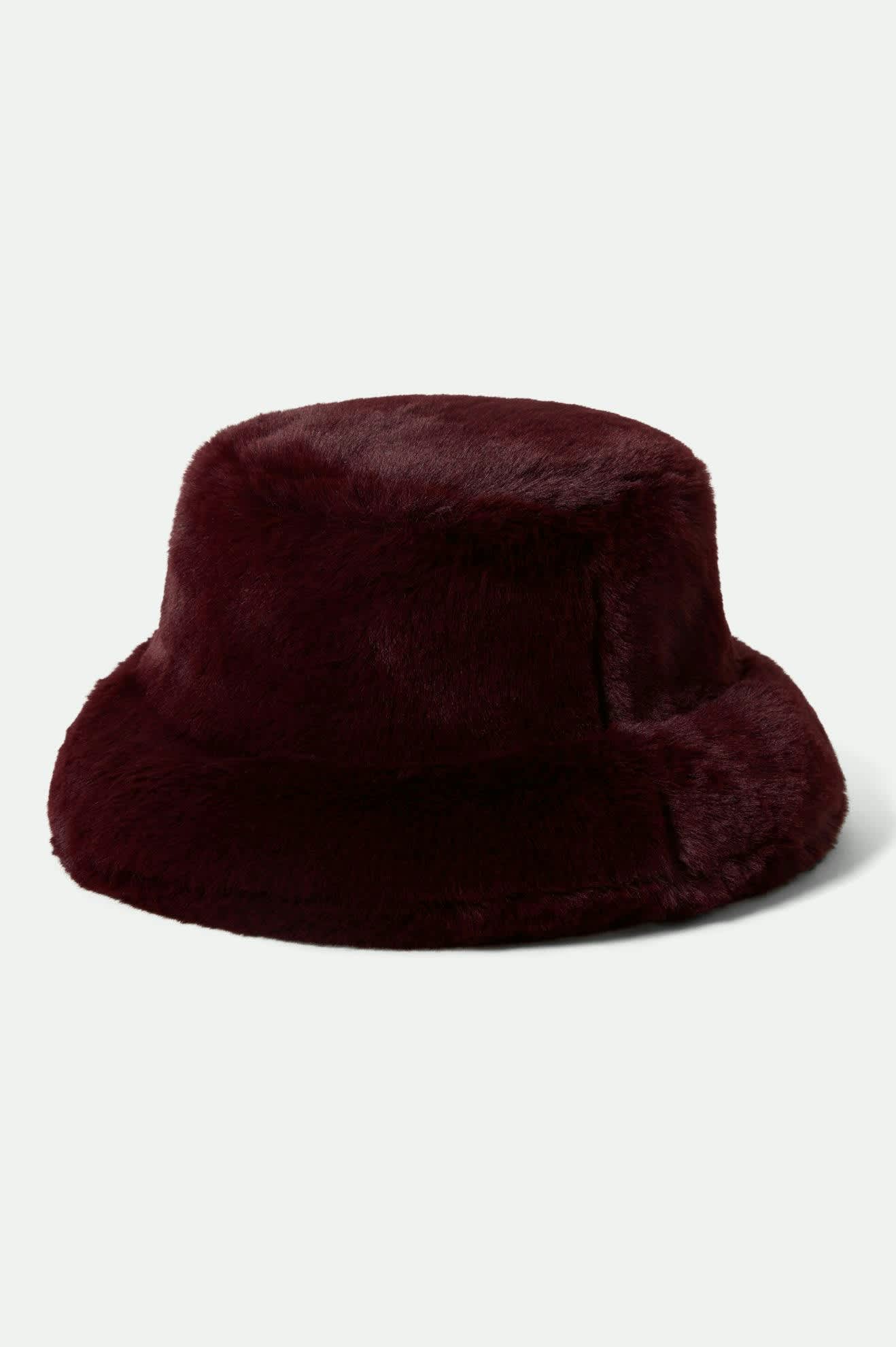 Women's Dion Packable Winter Bucket Hat in the color Port - Front Product View