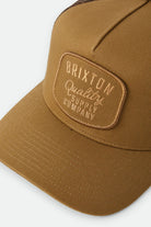 Unisex Hubal Trucker Hat in the color Dusted Ochre - Additional Laydown image