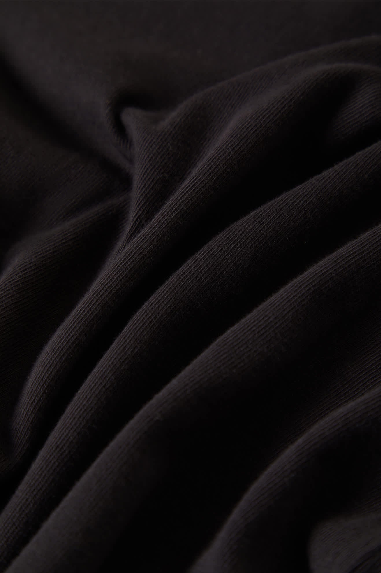 Women's Carefree Organic Garment Dye Slim L/S T-Shirt in the color Black - Additional Laydown image