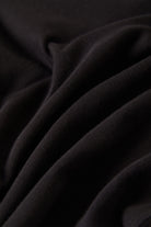 Women's Carefree Organic Garment Dye Slim L/S T-Shirt in the color Black - Additional Laydown image
