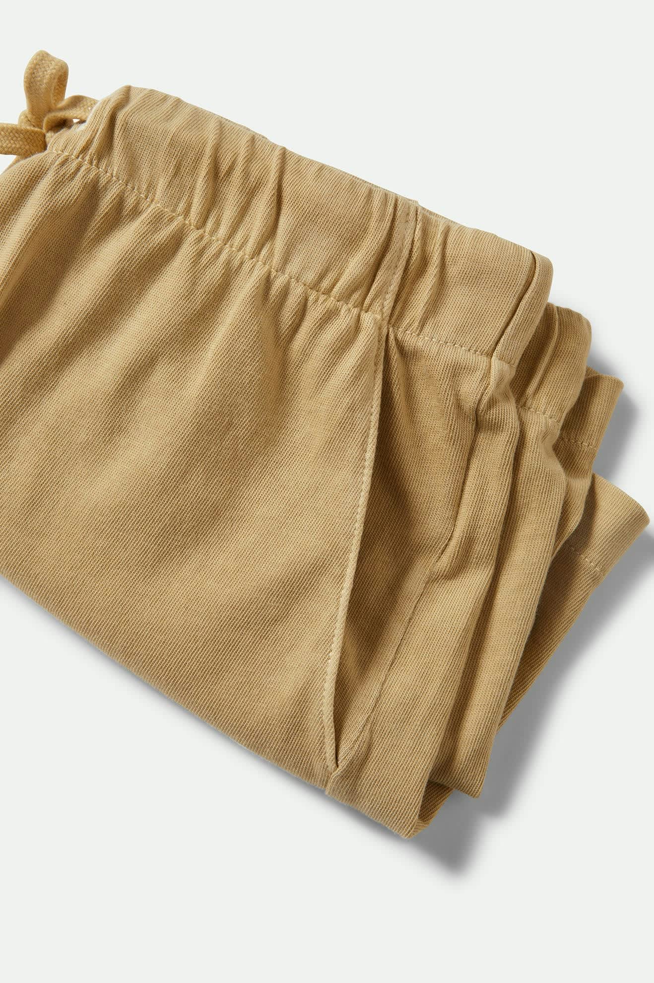 Women's Carefree Organic Garment Dyed Lounge Short in the color Pale Khaki - Additional Laydown image
