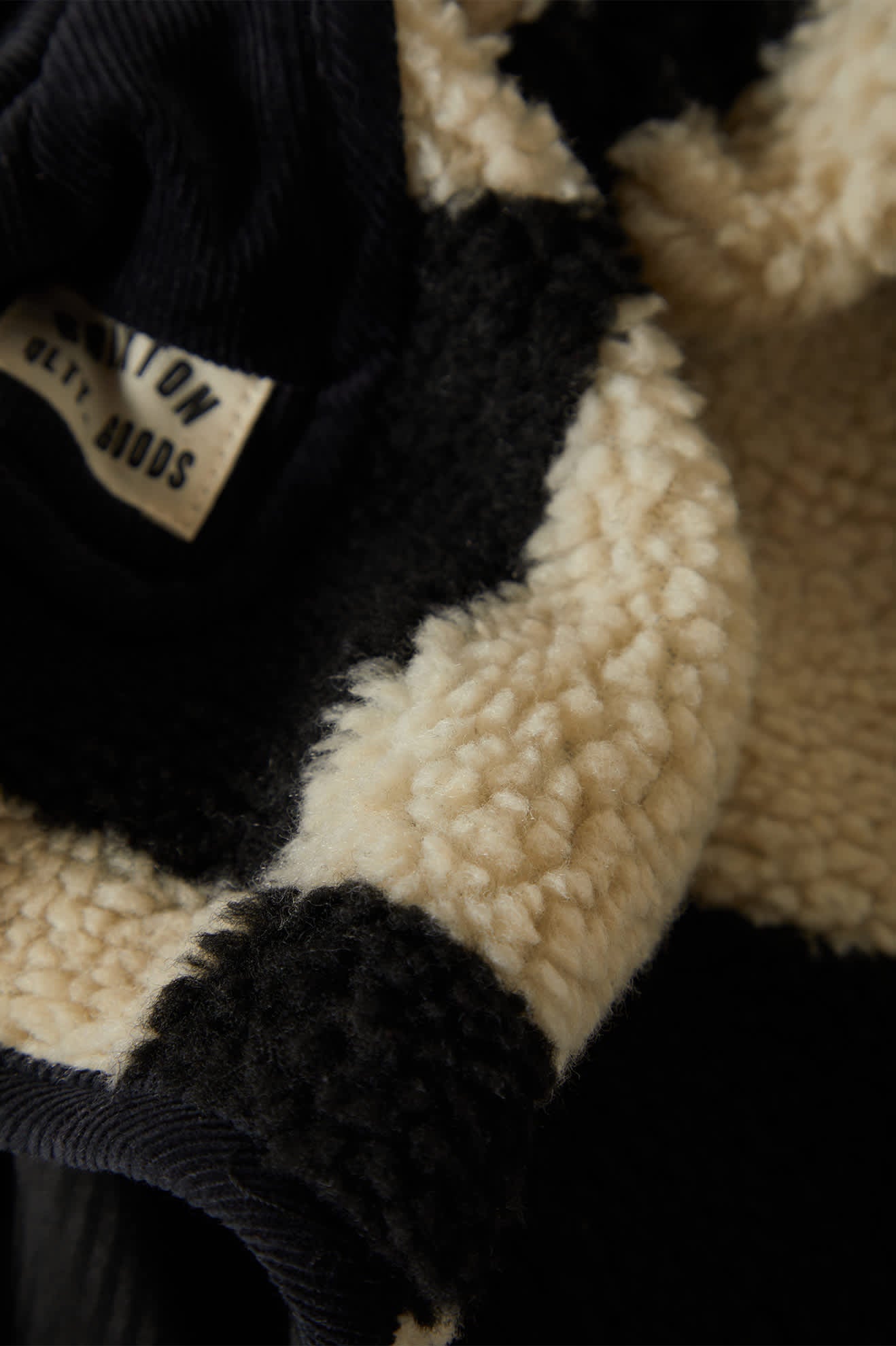 Women's Delilah Sherpa Jacket in the color Black/Natural Finish Line Checker - Additional Laydown image