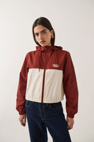 Women's Parsons Lightweight Hooded Windbreaker in the color Dark Brick/Whitecap - Additional Fit image