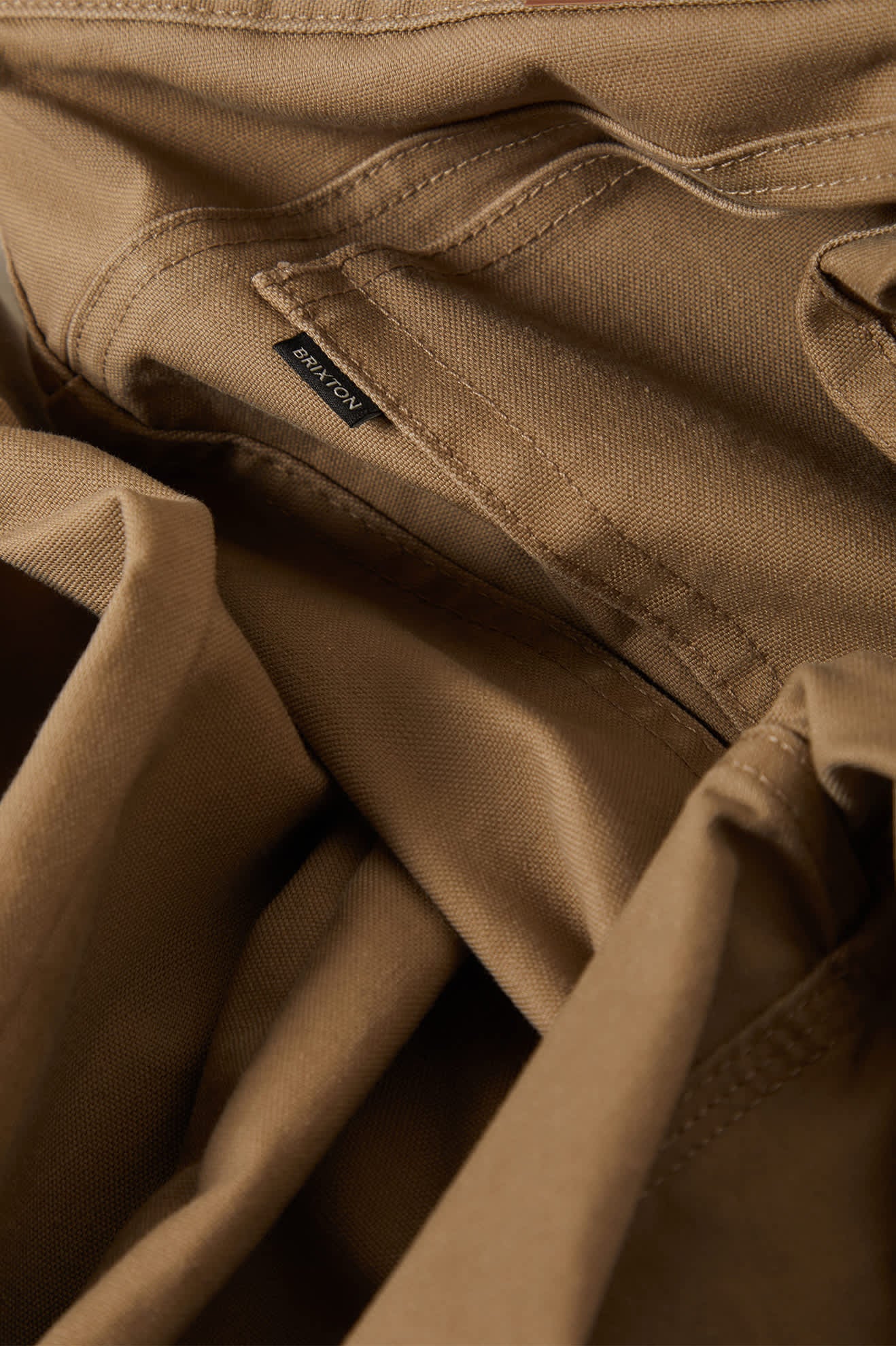 Men's Builders 5 Pocket Stretch Pant in the color Khaki - Additional Laydown image