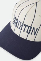 Unisex Homerun Snapback in the color Off White/Washed Navy - Additional Laydown image
