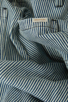 Women's Jane Ulitily Wide Leg Pant in the color Off White/Mood Indigo - Additional Laydown image