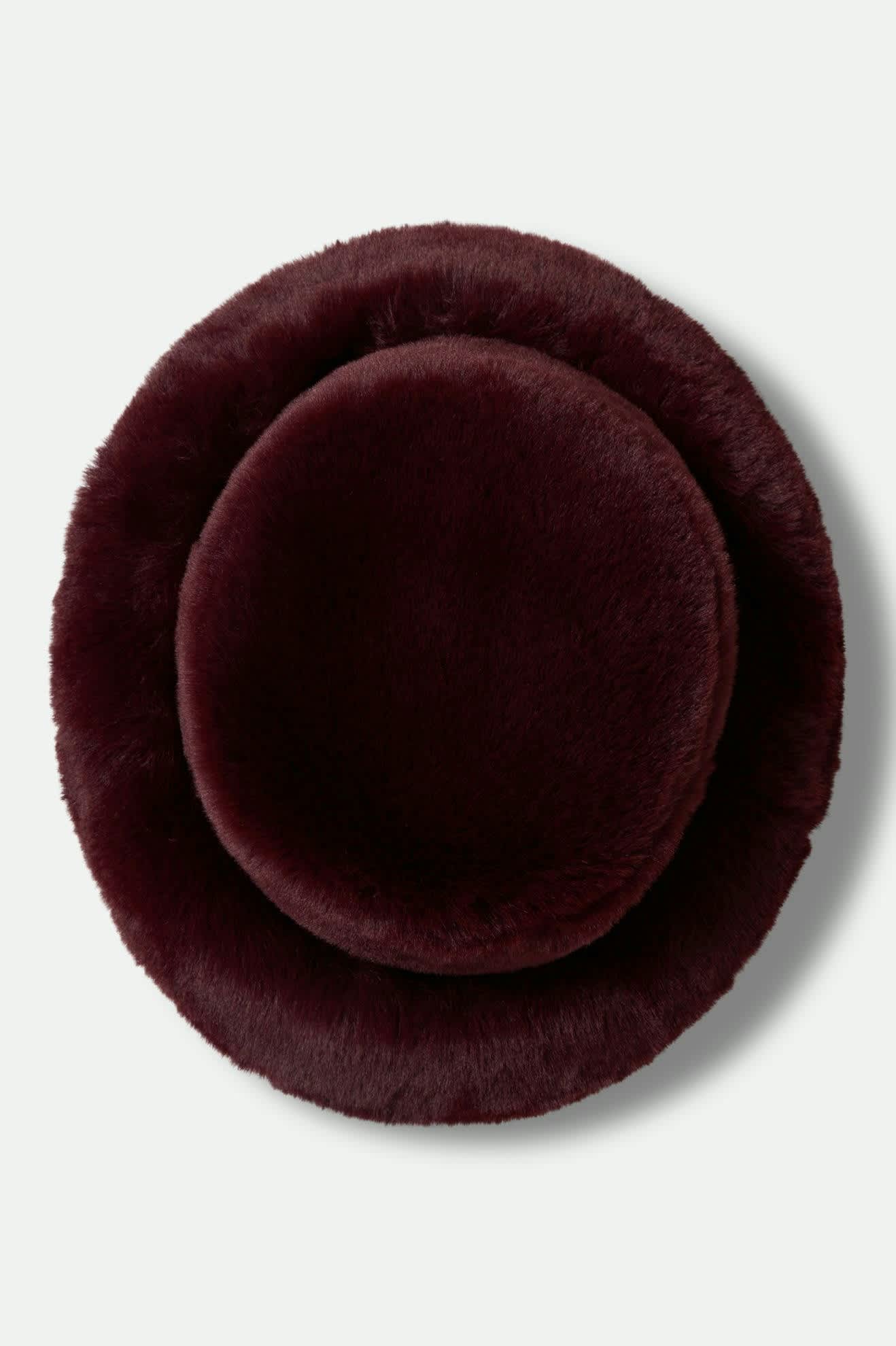 Women's Dion Packable Winter Bucket Hat in the color Port - Additional Laydown image