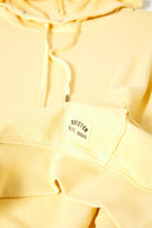 Women's Cross Loop French Terry Hoodie in the color Panna Cotta - Additional Style View