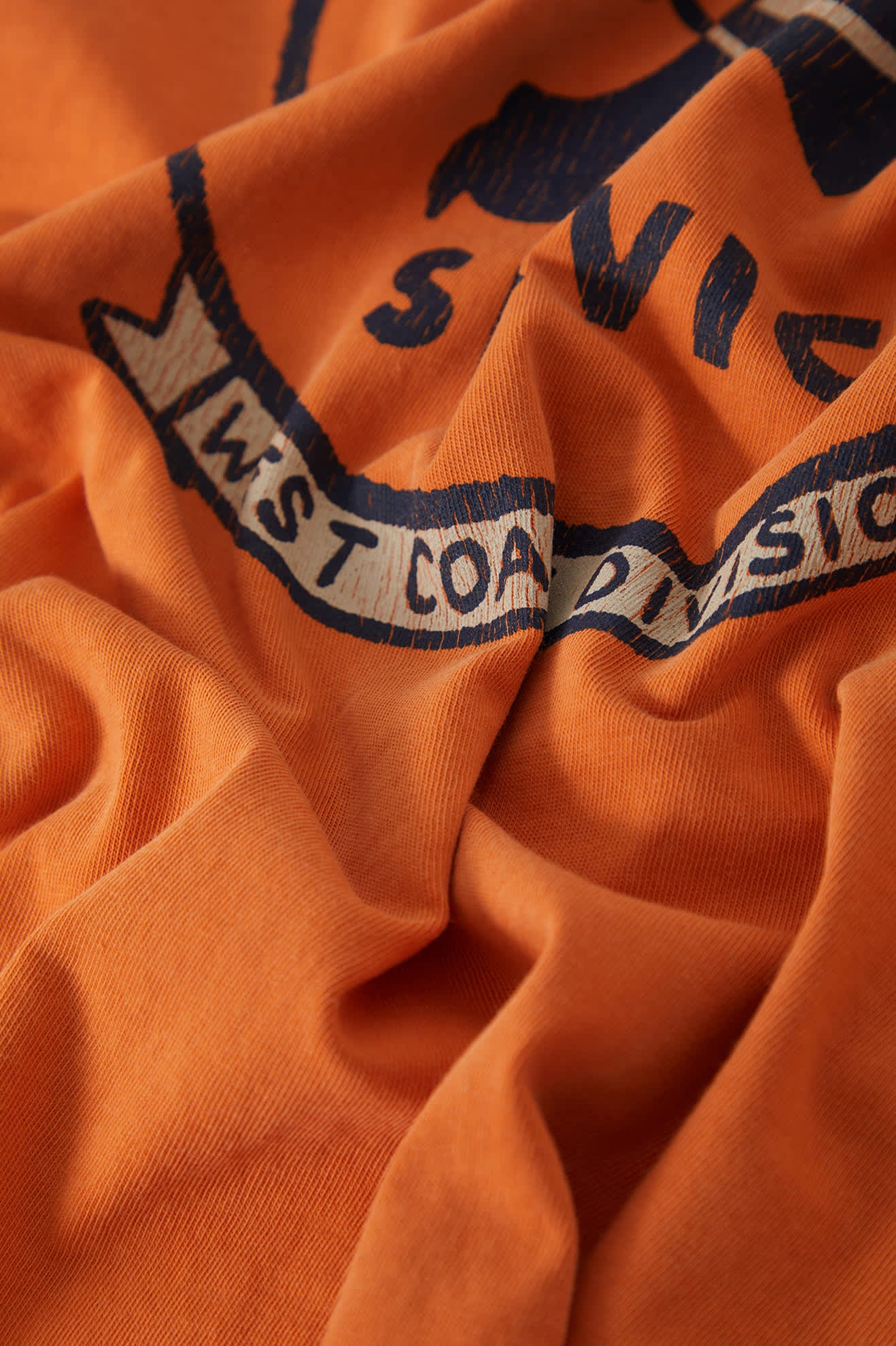 Men's 76 Minute Man Standard T-Shirt in the color Washed Orange - Additional Laydown image