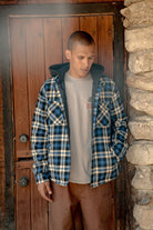 Men's Bowery Quilited Hooded Flannel in the color Navy/Cream - Men's Lifestyle image