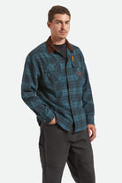 Men's Builders Bowery Stretch Water Resistant Flannel in the color Night Sage/Black - Men's Front View