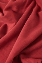 Women's Carefree Organic Garment Dye Cropped Tank in the color Robust Red - Additional Laydown image