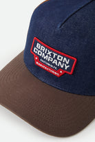 Unisex Reeves Trucker Hat in the color Washed Denim/Caramel - Additional Laydown image