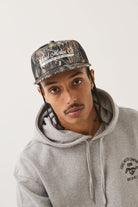 Unisex Ford X Brixton Trucker Hat in the color Boxwood Green - Men's Front View