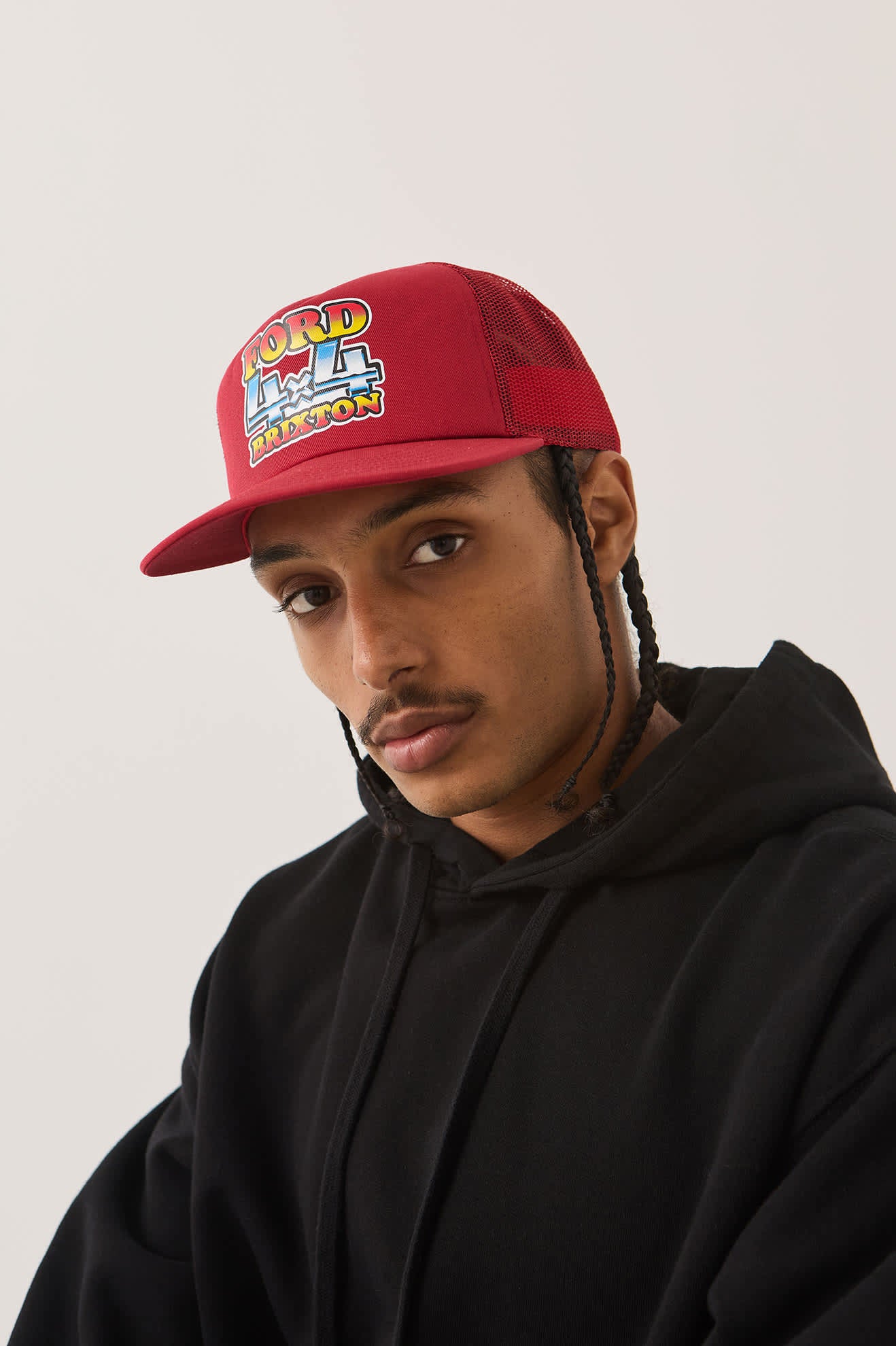 Unisex Ford 4x4 Chrome Trucker Hat in the color Rangoon Red - Men's Front View