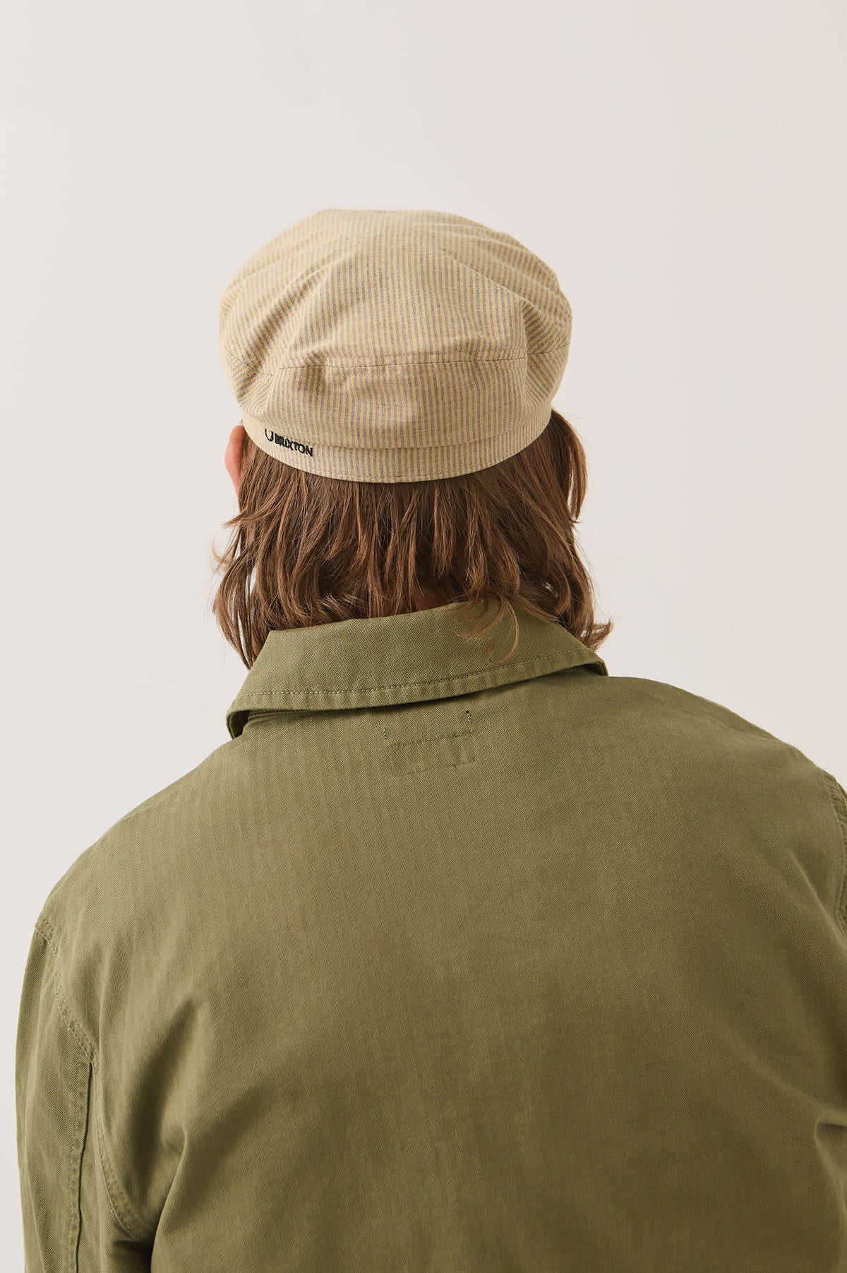 Women's Fiddler Fisherman Cap in the color Khaki Stripe/Washed Black - Men's Back View