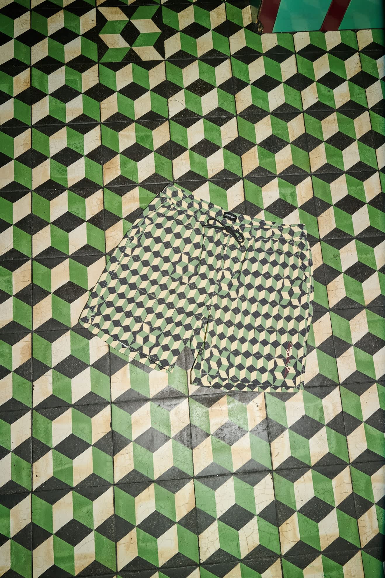 Men's Burger She Wrote Hybrid Short in the color Black/Green Tile - Additional Laydown image