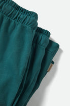 Women's Carefree Organic Garment Dye Lounge Short in the color Washed Mediterranean Teal - Additional Laydown image