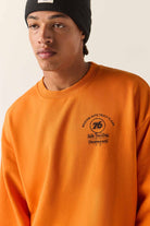 Men's 76 Chopped Crew Fleece in the color Washed Orange - Additional Fit image