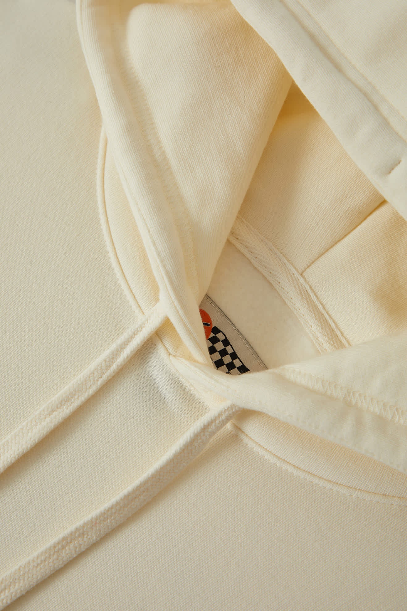 Men's 76 Finish Line Hoodie in the color Washed Off White - Additional Laydown image