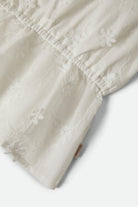 Women's The Abigail Tie Top in the color Off White Floral - Additional Laydown image