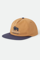 Unisex Drifter Netplus Snapback in the color Brown Sugar/Navy - Front Product View