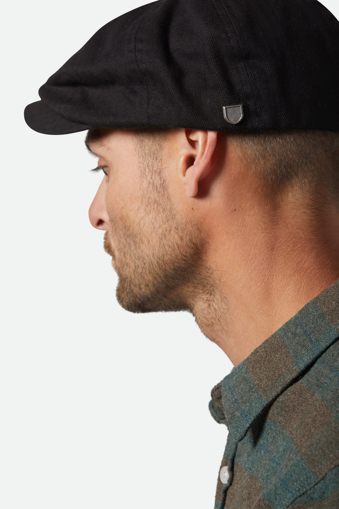 Unisex Brood Newsboy Cap in the color Black - Men's Side View