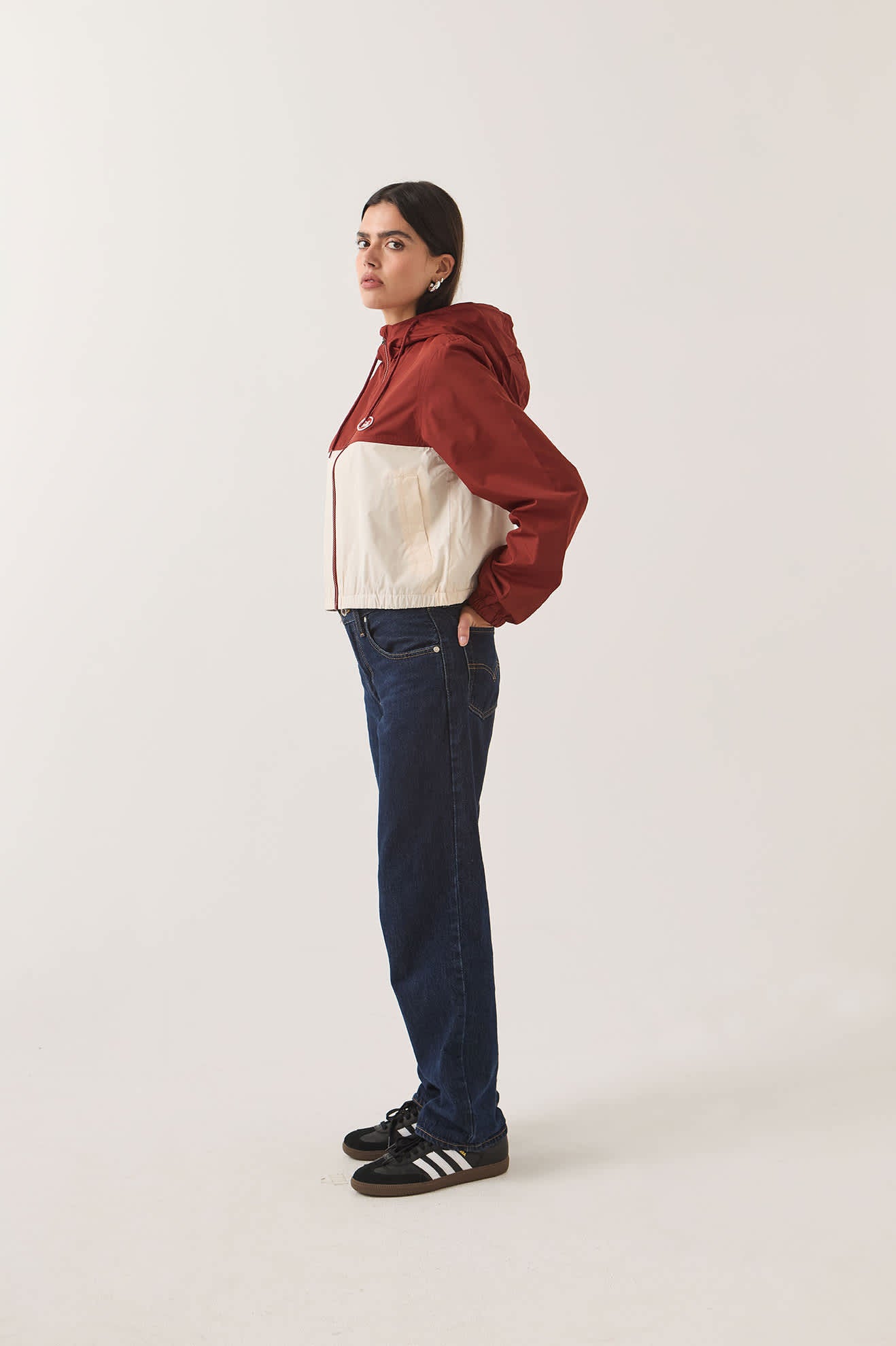 Women's Parsons Lightweight Hooded Windbreaker in the color Dark Brick/Whitecap - Women's Side View