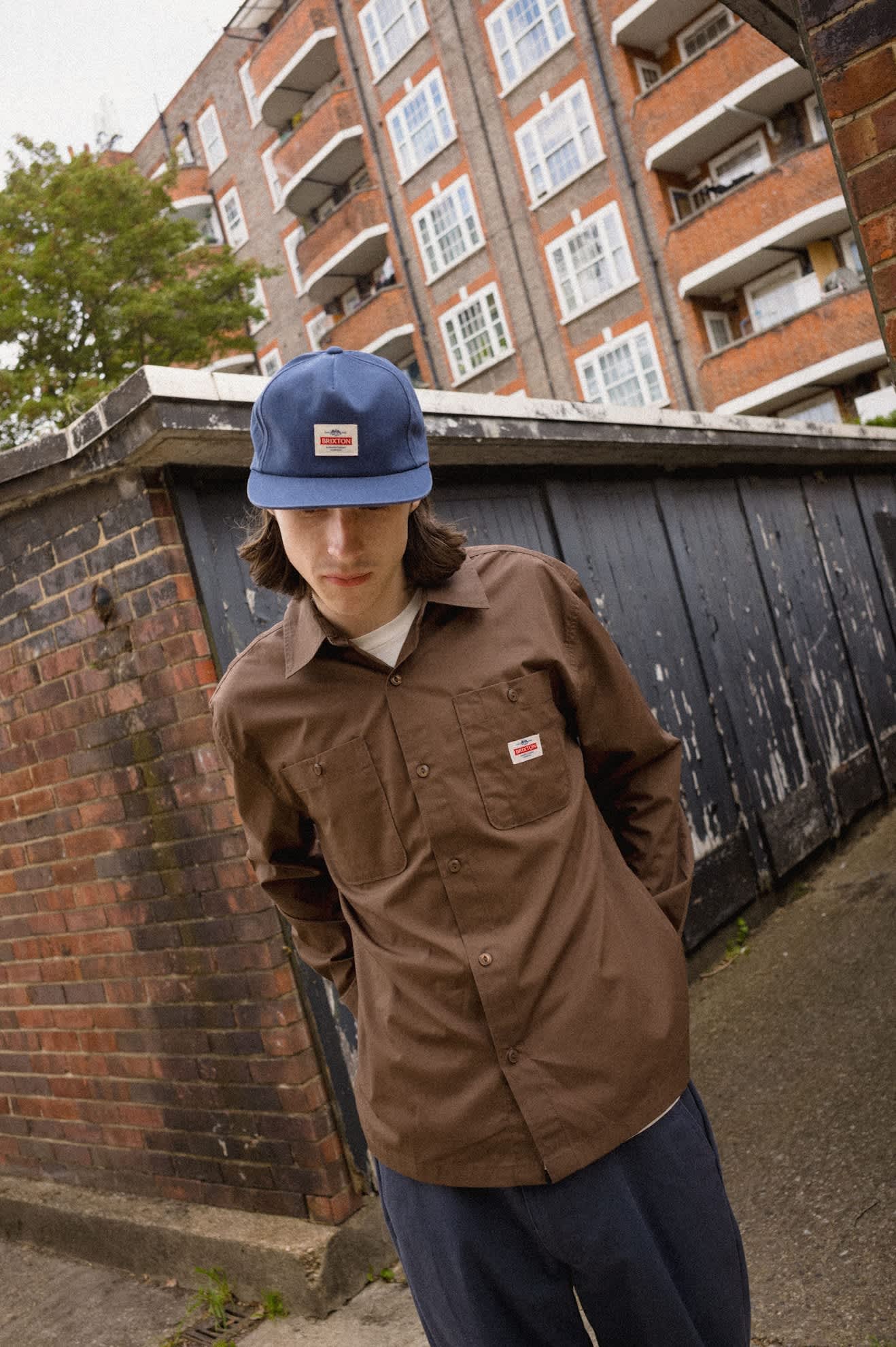Unisex Trademark Adjustable Hat in the color Washed Navy - Men's Lifestyle image
